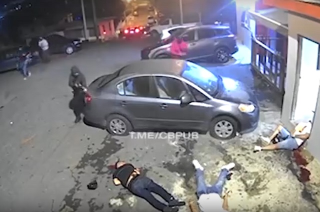 Хладнокровная расправа бандитов над своими конкурентами попала на видео (18+)